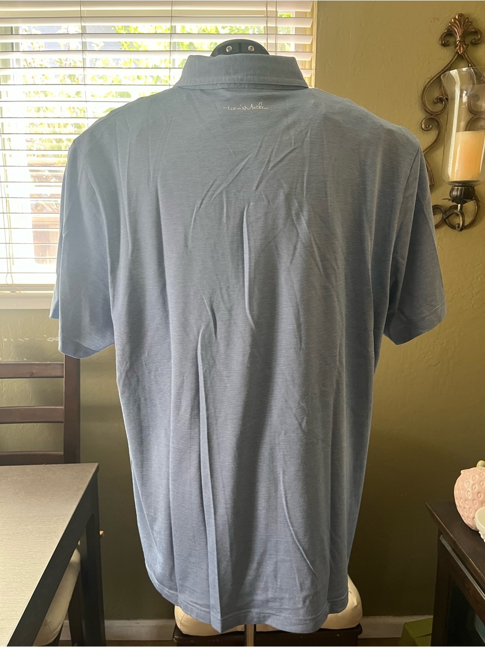 Travis Mathew’s Light Blue Short-Sleeve Polo Shirt